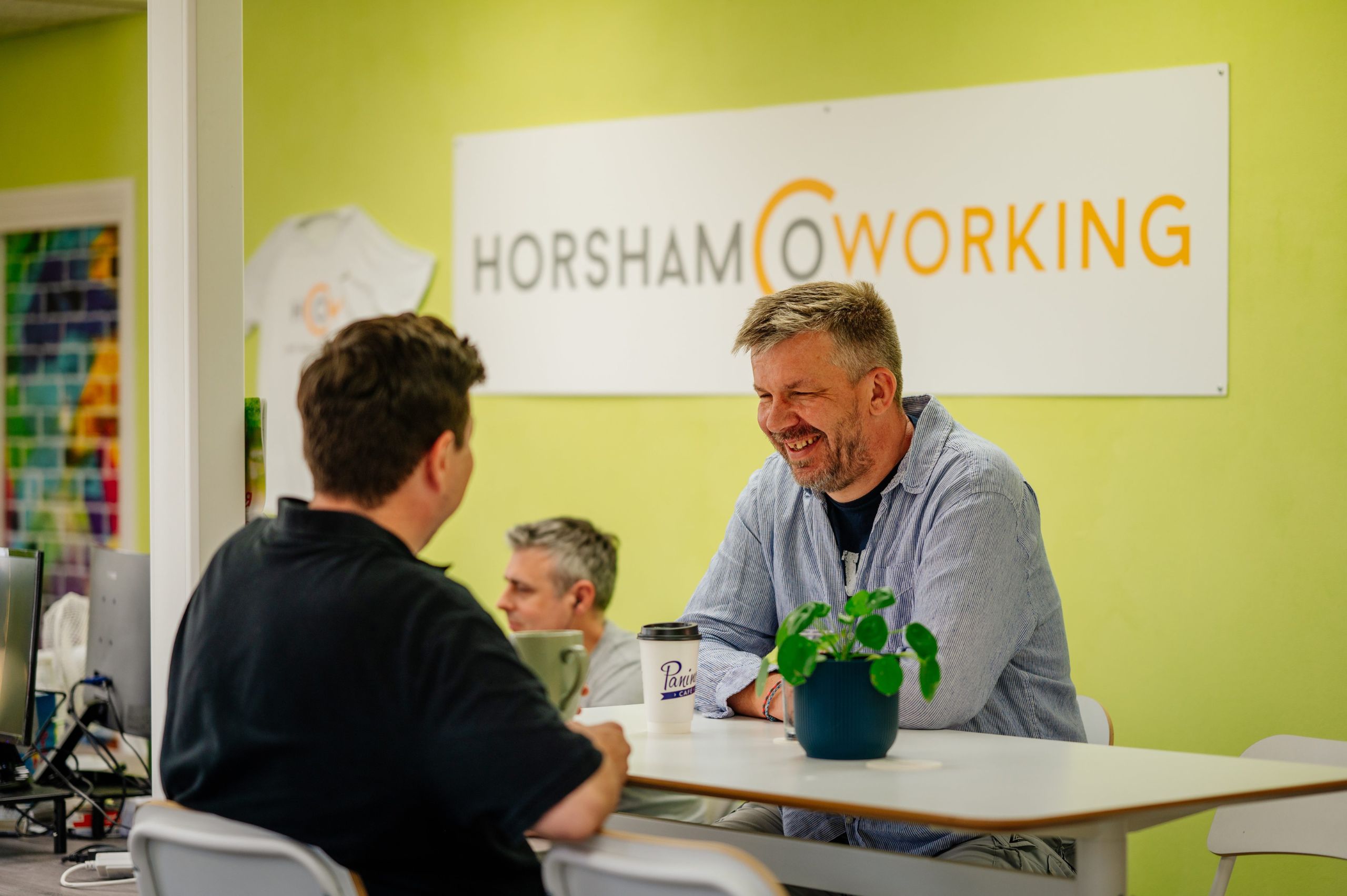 people chatting in horsham coworking office