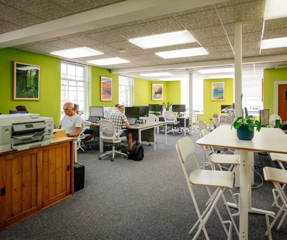 Looking into the Horsham Coworking office, where people are working